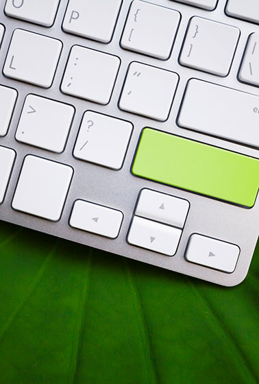 Green button on laptop