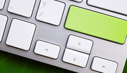 Green button on laptop