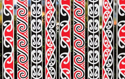 maori patterns on a fence thumb10
