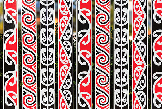 maori patterns on a fence thumb5