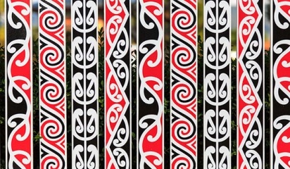 maori patterns on a fence thumb7